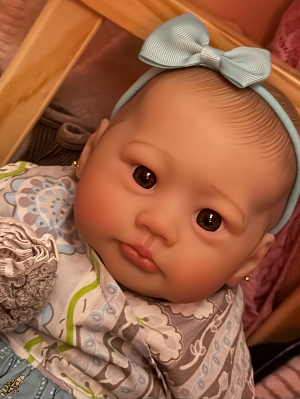 Realistic Baby Doll with Blue Bow Headband